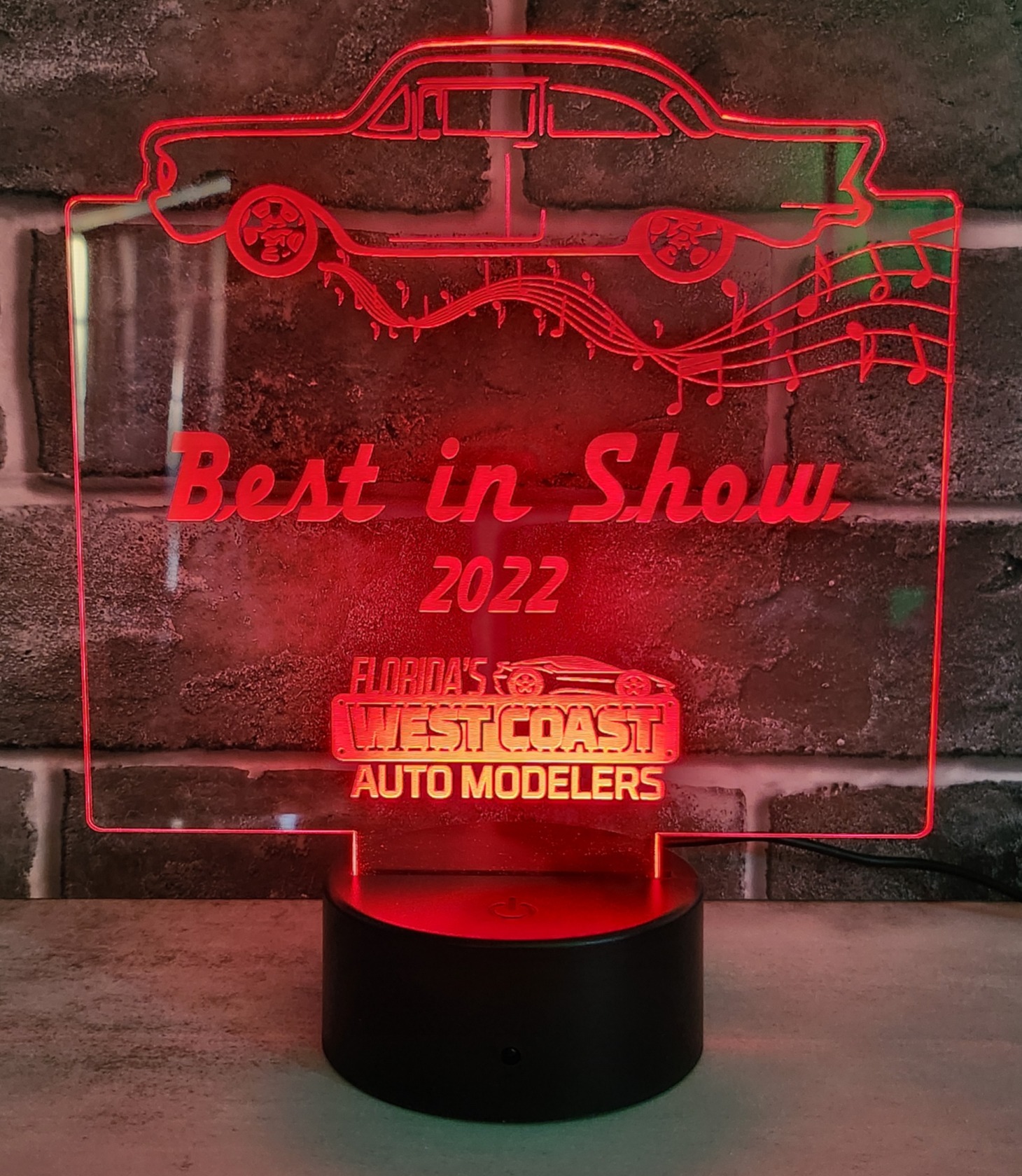 Custom LED light created for an award ceremony of a car that reads Best in Show 2022